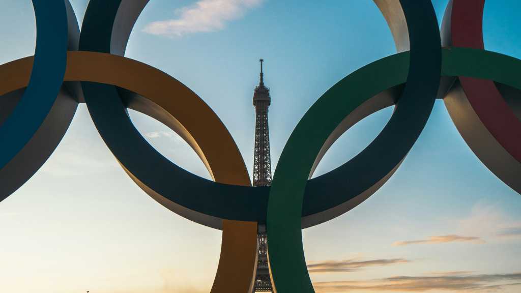 Olympic rings in front of Eiffel Tower